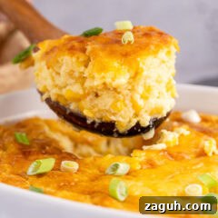 Creamy Southern-Style Corn Pudding Recipe 12 Close up photo of a scoop of Corn Pudding