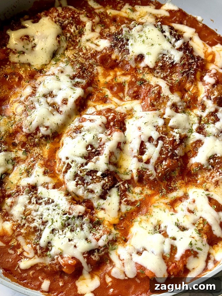 25-Minute Chicken Parmesan Recipe for Busy Family Dinners 2 Quick chicken parmesan in a skillet