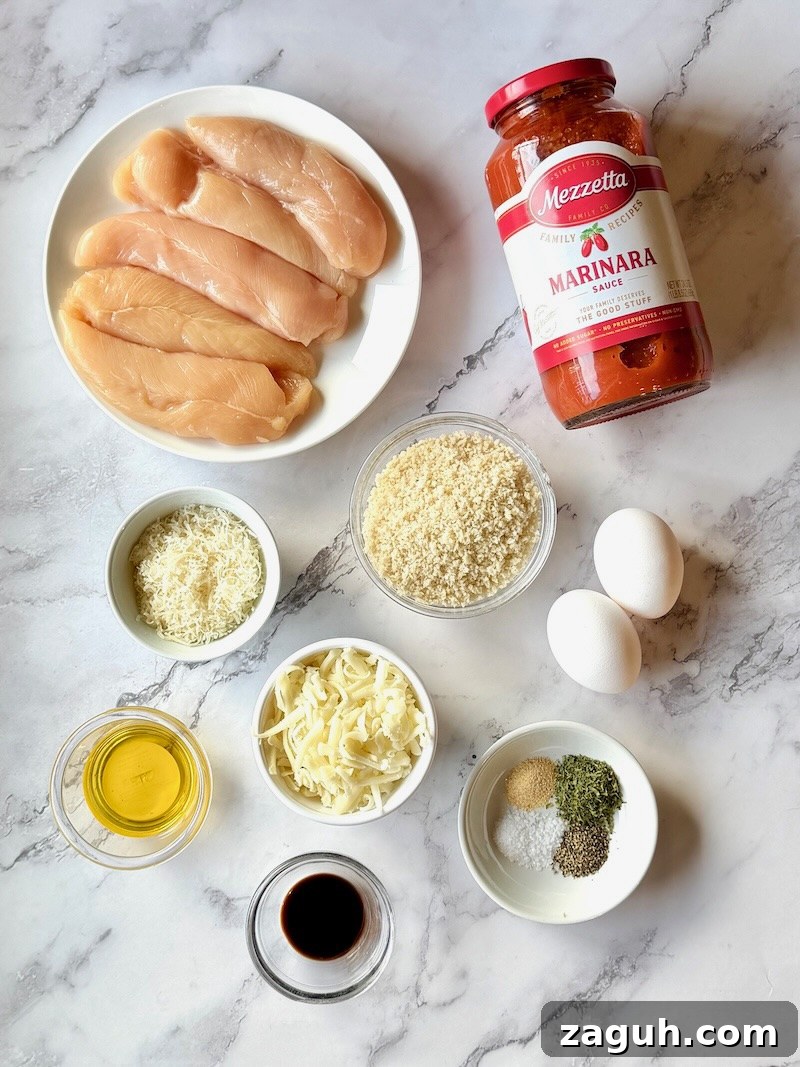 25-Minute Chicken Parmesan Recipe for Busy Family Dinners 3 Ingredients listed for chicken parmesan. Chicken tenders, pasta sauce, bread crumbs, parmesan cheese, eggs, olive oil, seasonings, balsamic vinegar, and mozzarella cheese.