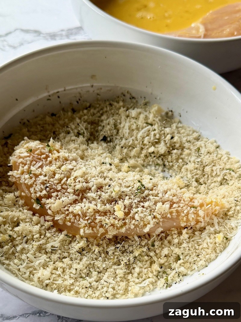 25-Minute Chicken Parmesan Recipe for Busy Family Dinners 7 chicken tenders coated in bread crumb mixture.