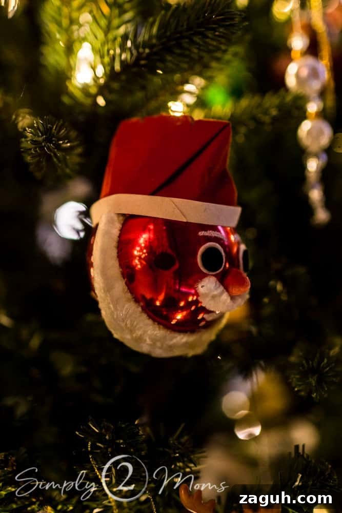 Classic Christmas Candlelight Tour You Have to See This Year 11 vintage ornament hanging on tree with Christmas lights