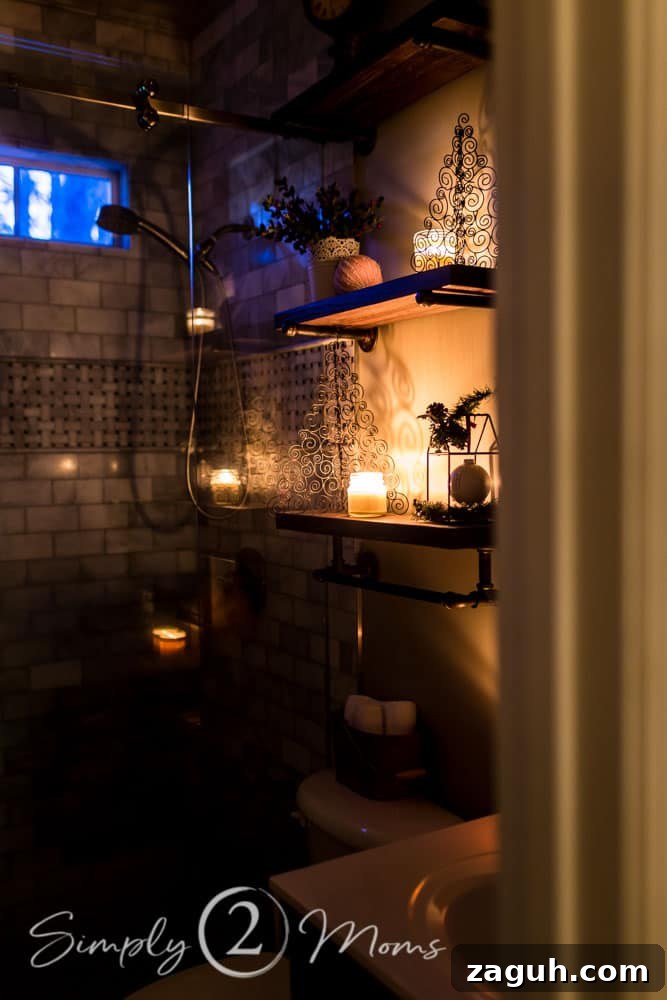 Classic Christmas Candlelight Tour You Have to See This Year 14 plumbing pipe shelves in bathroom decorated for Christmas at night with candles lit