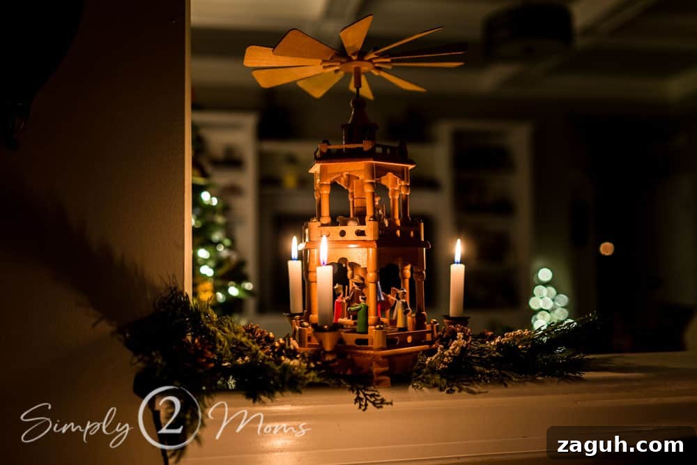 Classic Christmas Candlelight Tour You Have to See This Year 19 Christmas pyramid with greenery and candles