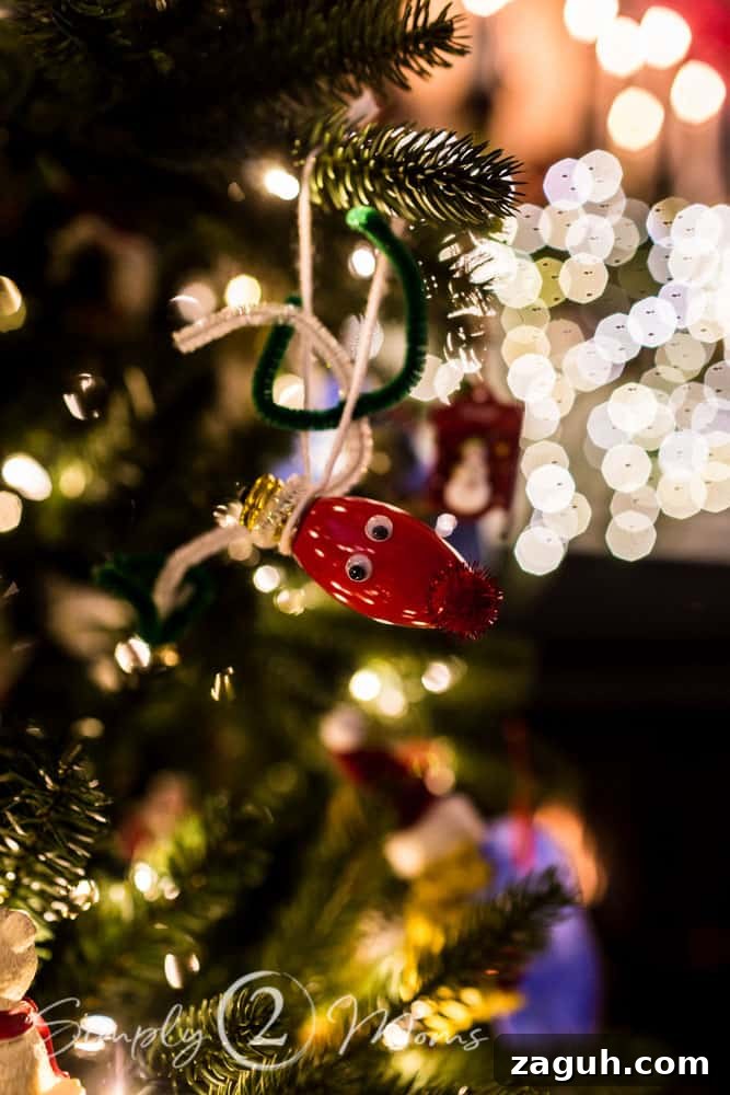 Classic Christmas Candlelight Tour You Have to See This Year 9 handmade ornament hanging on tree with Christmas lights