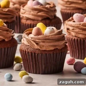 Decadent Chocolate Easter Cupcakes with Spring Decorations 15 A close up of Easter Chocolate Cupcakes with mini eggs on top.