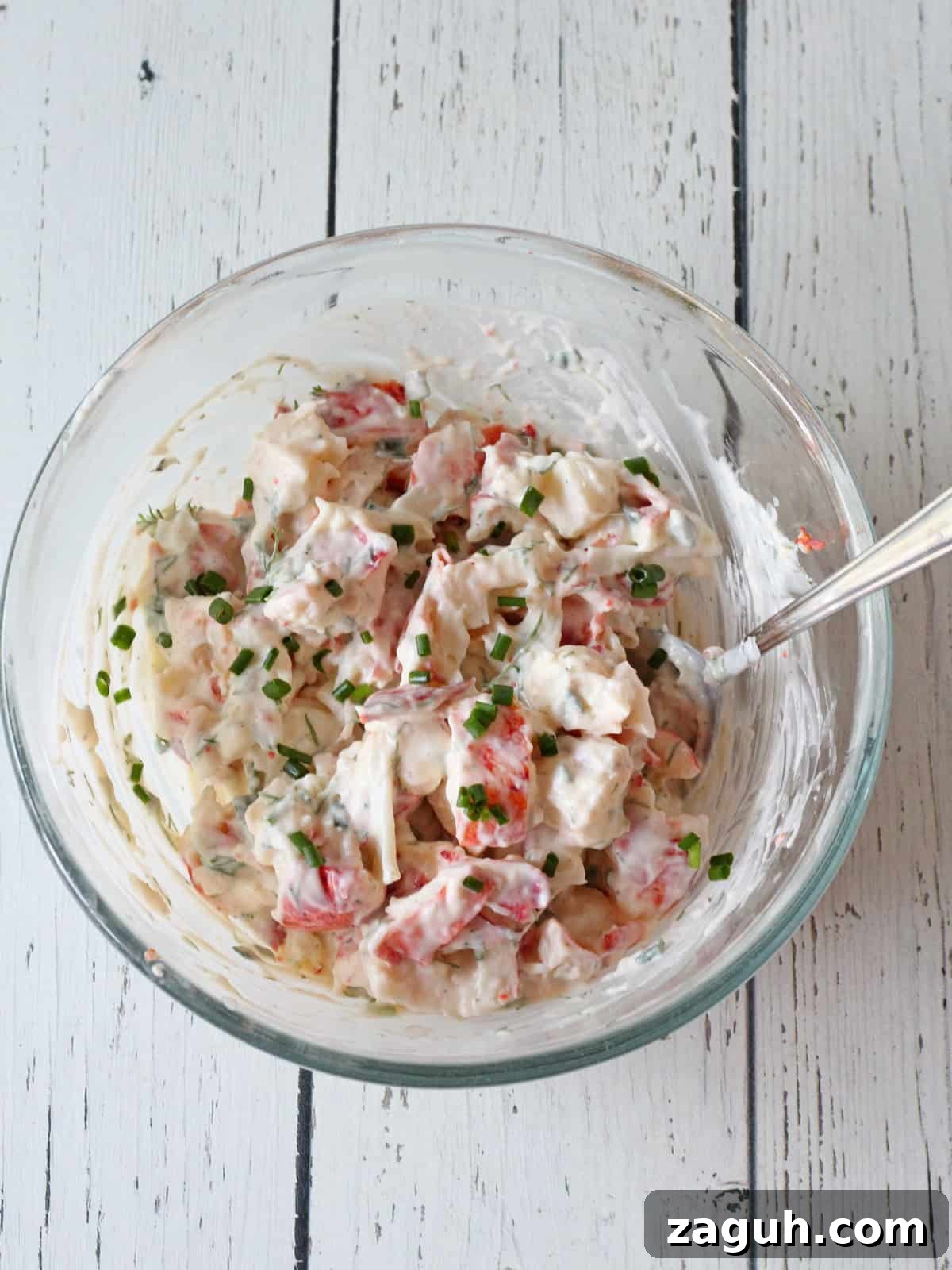Classic New England Lobster Rolls: Authentic Recipe & Tips 5 lobster mixture with mayonnaise and butter