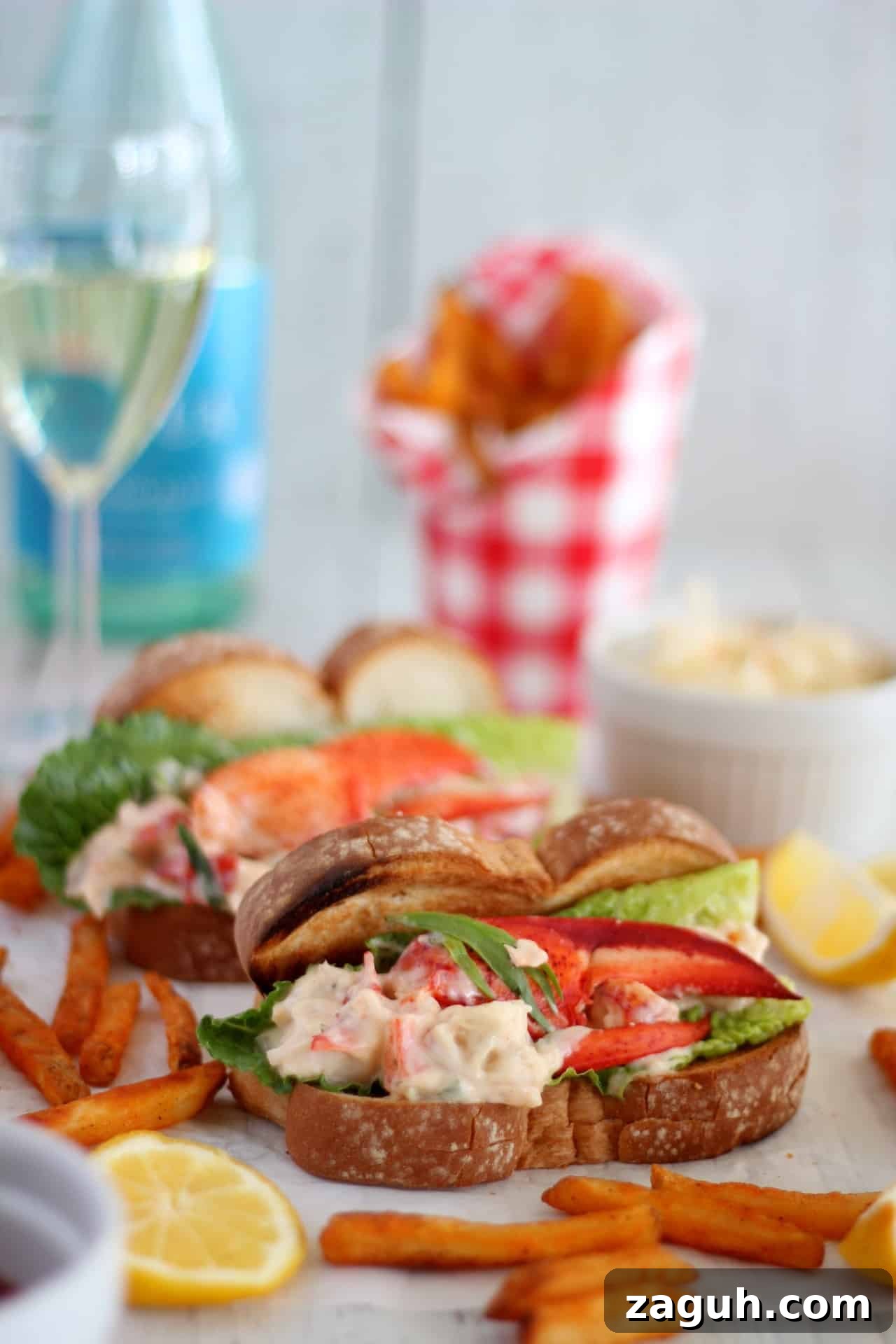 Classic New England Lobster Rolls: Authentic Recipe & Tips 6 lobter mixture in hot dog bun