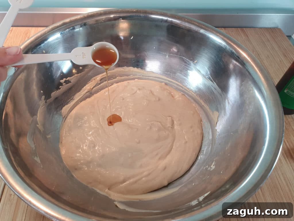 Peanut Butter & Jelly Ice Cream Recipe: Creamy PB&J Frozen Treat 6 Adding vanilla essence