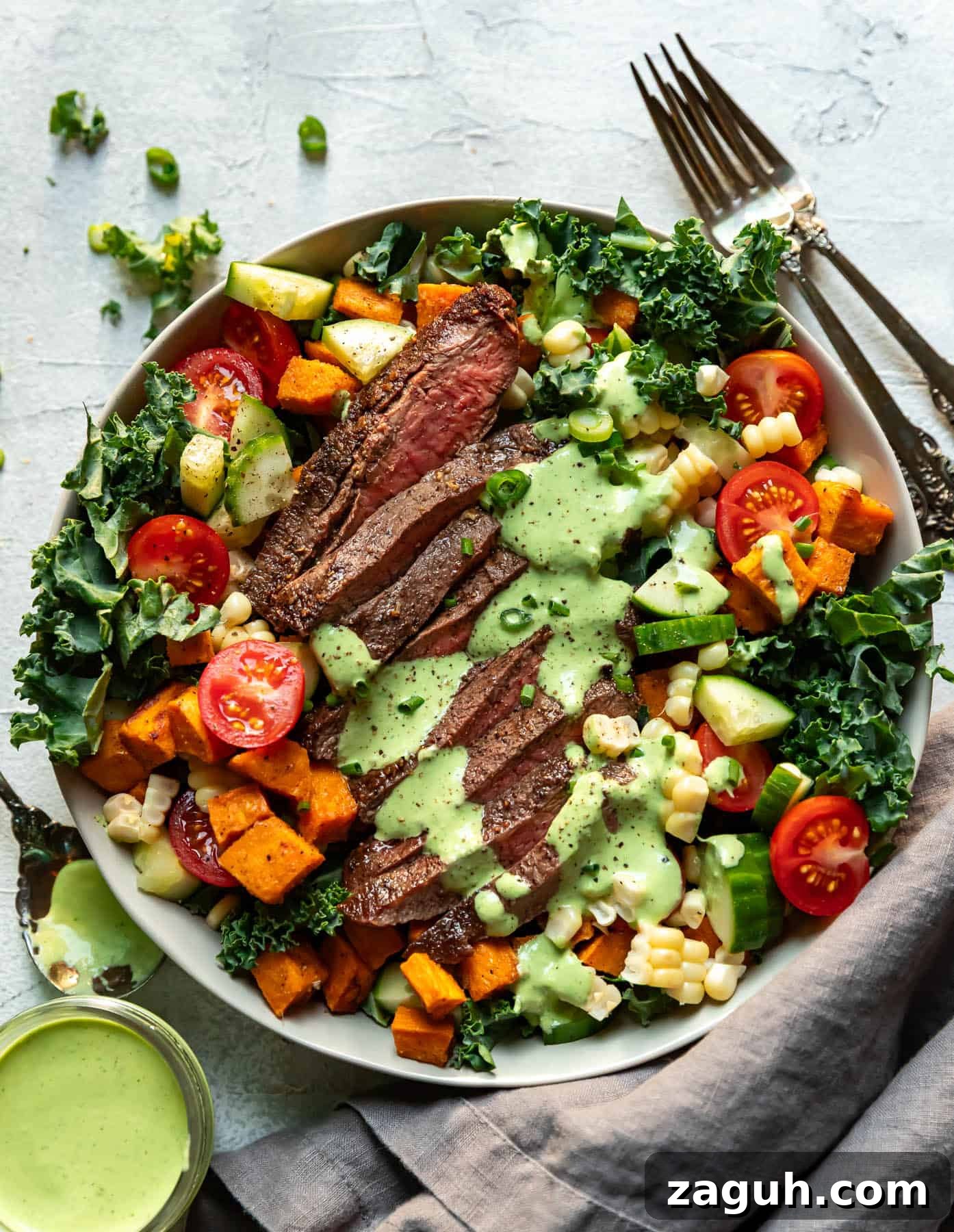 Green Goddess Steak Salad with Kale and Avocado Dressing 2 steak salad in a bowl.