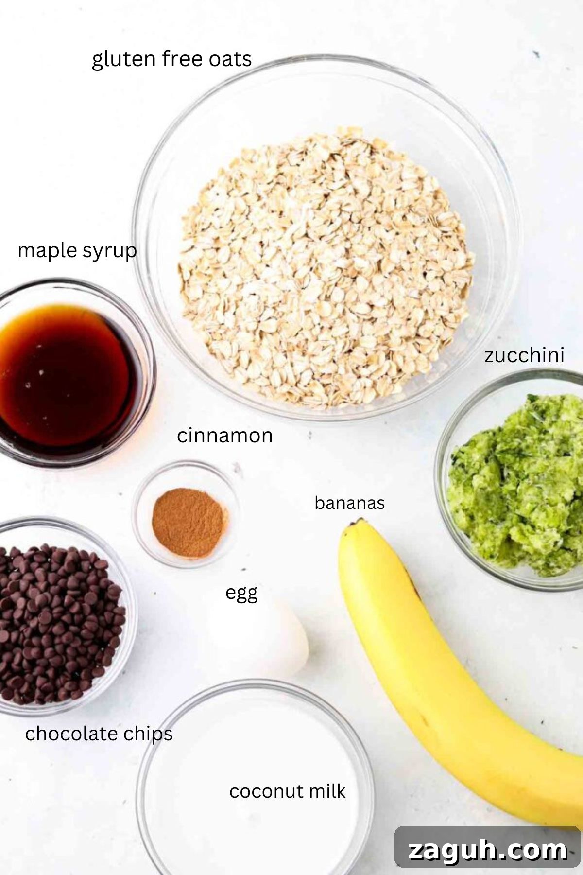 zucchini oatmeal bars 6 1 Zucchini oat bar ingredients in glass bowls.