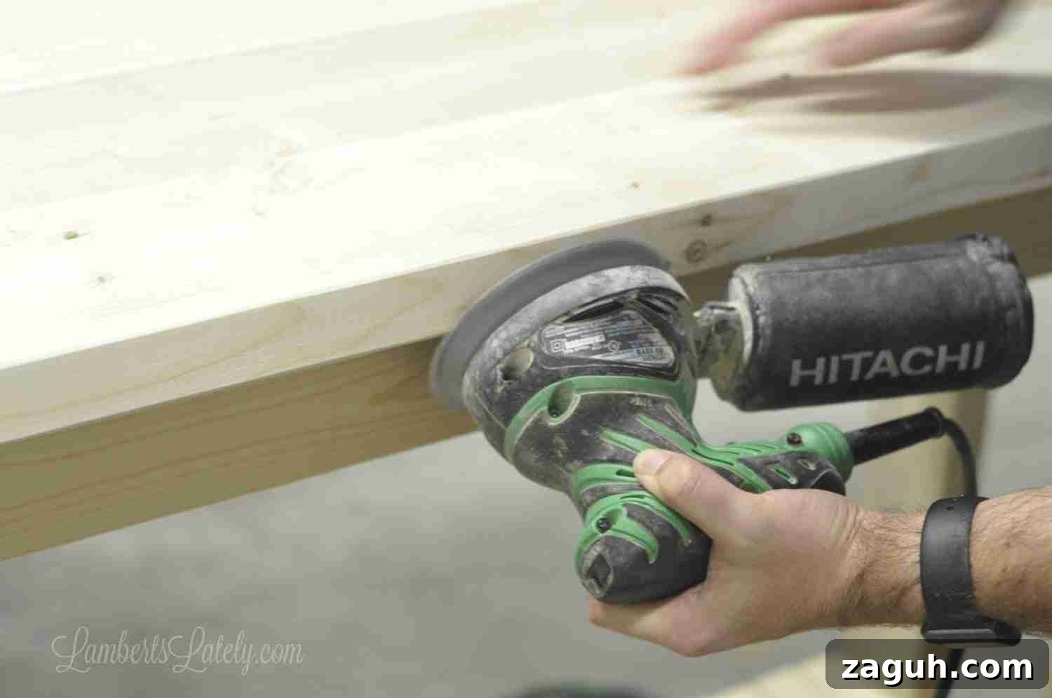 DIY Console Table Plans: Step-by-Step Build Guide and Dimensions 13 sanding a console table.