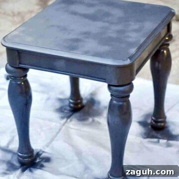 table covered in black spray paint.