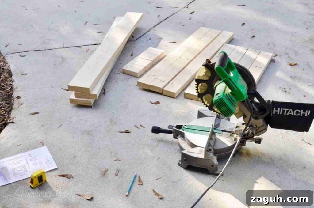 DIY Console Table Plans: Step-by-Step Build Guide and Dimensions 4 pieces of cut 2x4 next to a miter saw.
