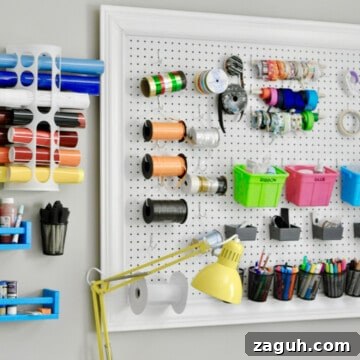 craft room peg board with colorful accessories.