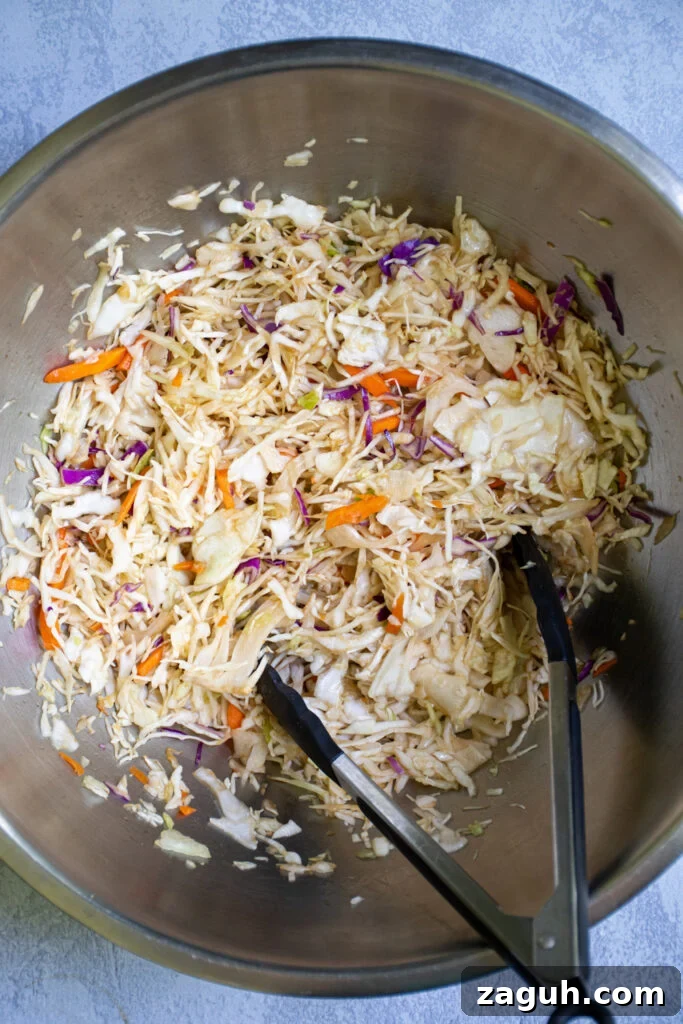 Grilled Tuna Steak Tacos with Crunchy Coleslaw 6 A large bowl filled with asian coleslaw ready to be used for the tuna steak tacos.