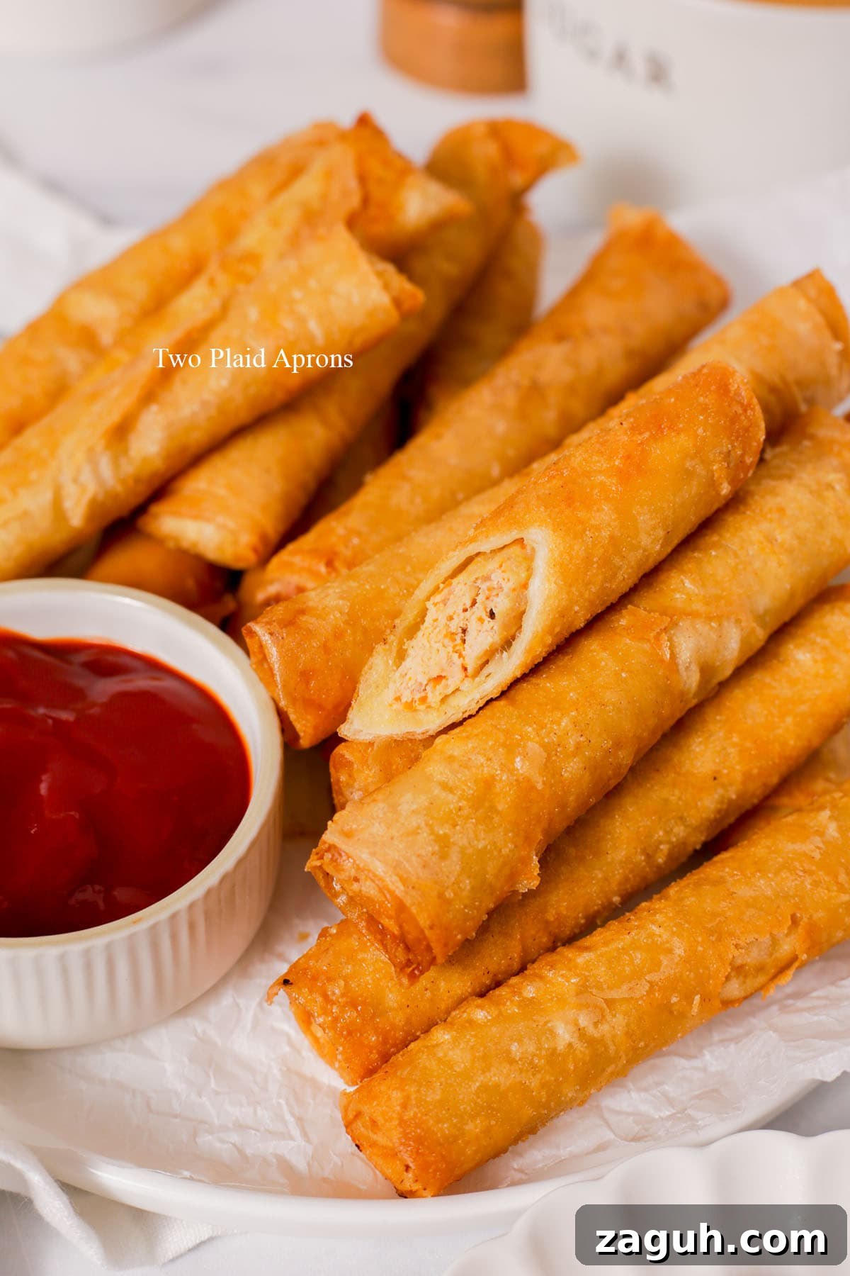 Filipino Lumpia: Classic Crispy Spring Rolls Recipe 2 Close up of lumpia cut in half.