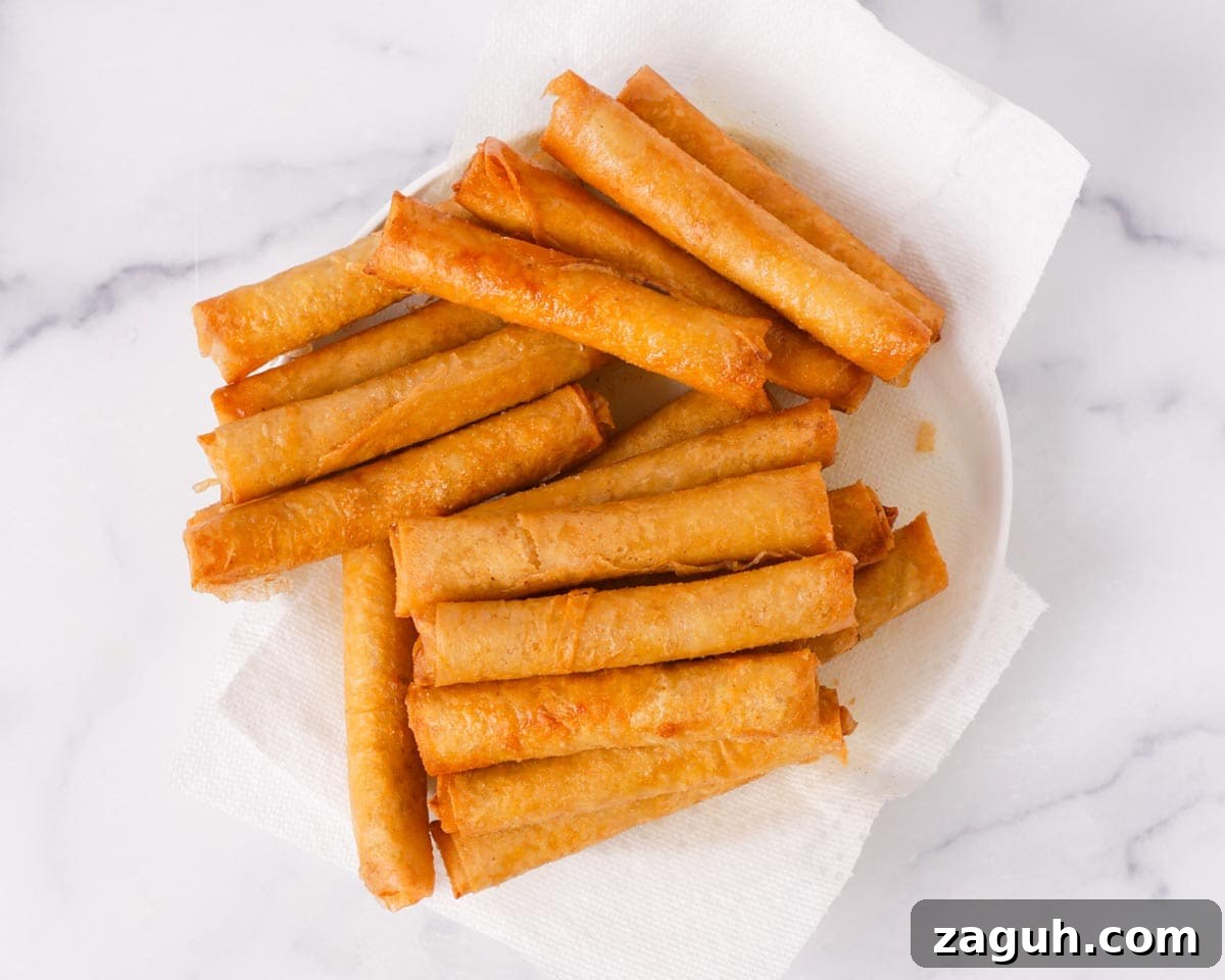 Filipino Lumpia: Classic Crispy Spring Rolls Recipe 12 Lumpia fried.