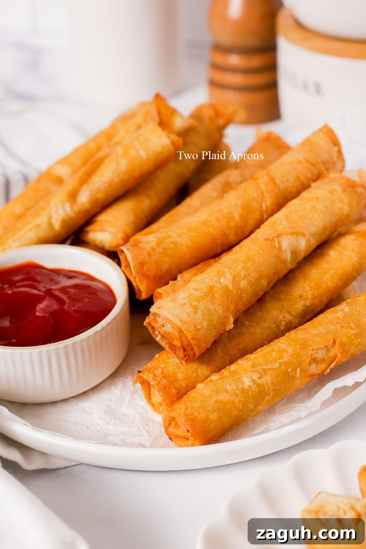 Filipino Lumpia: Classic Crispy Spring Rolls Recipe 21 Lumpia on the plate.