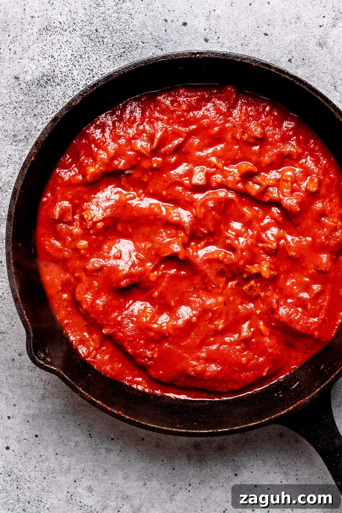 One-Pot Chorizo Pasta with 7 Ingredients — Ready Fast 9 Tomato sauce in a pan with chorizo.