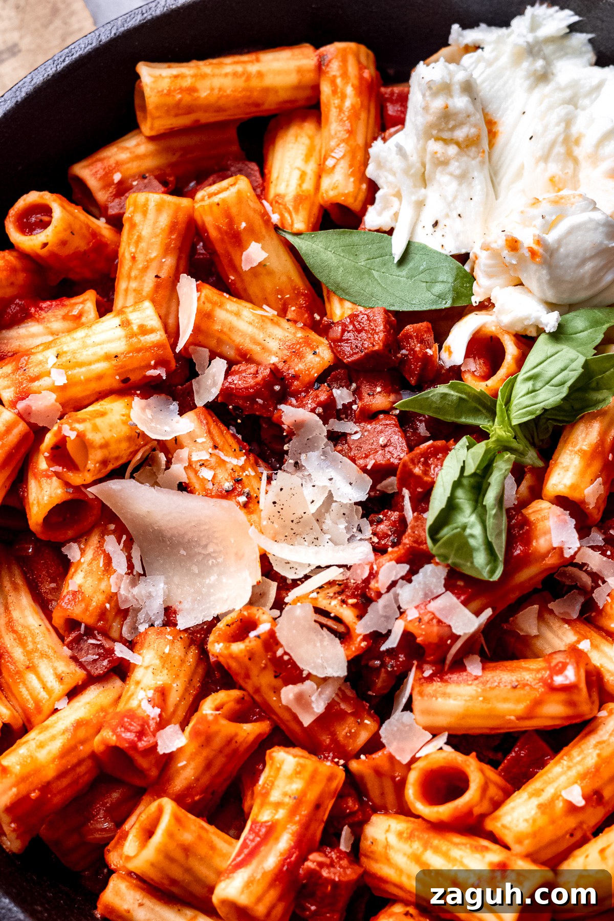 One-Pot Chorizo Pasta with 7 Ingredients — Ready Fast 10 Chorizo rigatoni in a pan with mozzarella.