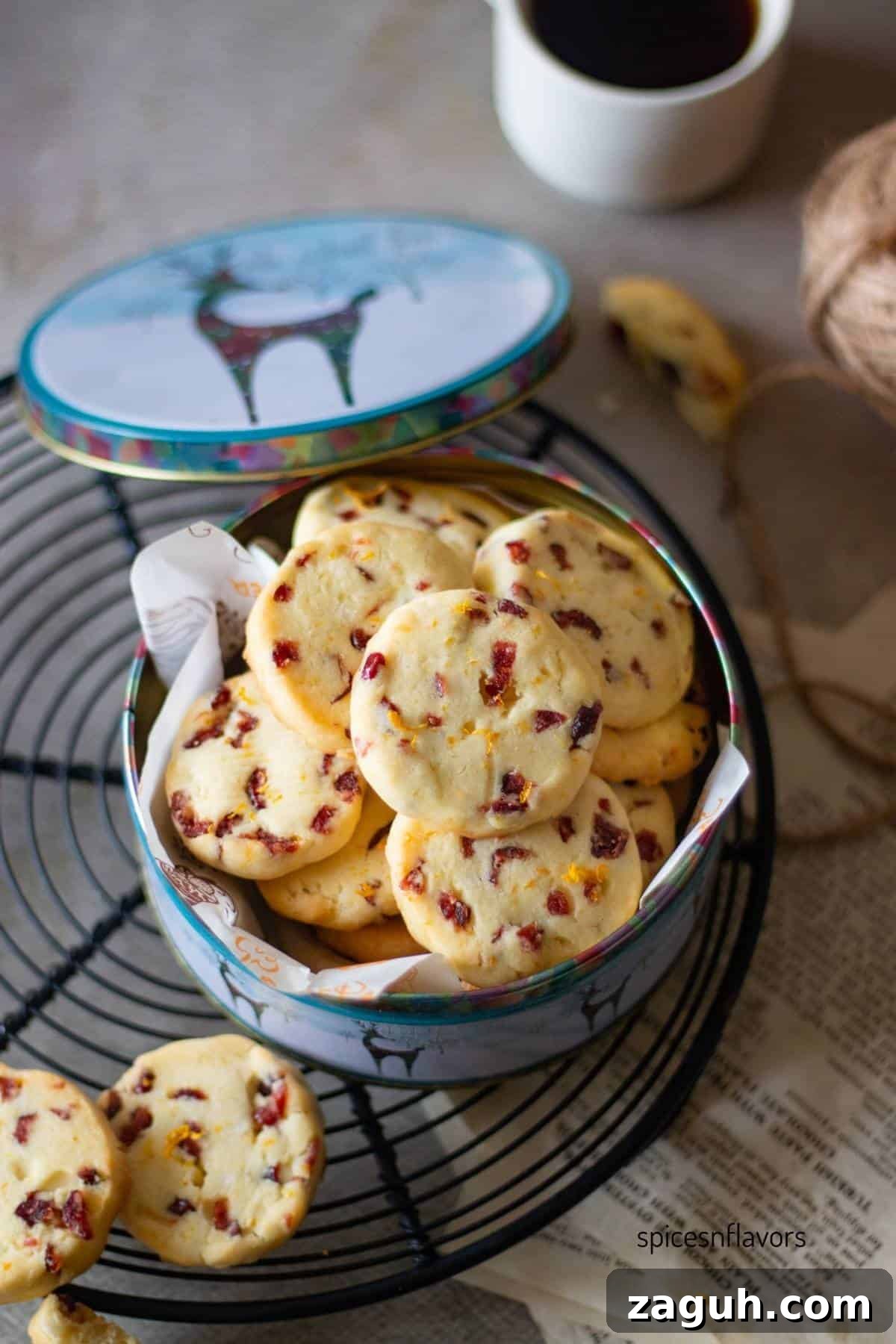 Cranberry Orange Shortbread Cookies (Egg-Free) 9 cranberry orange cookies placed in christmas tin