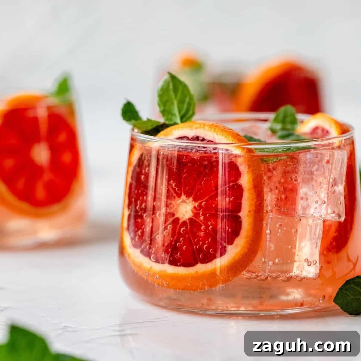 A blood orange moscow mule garnished with blood orange slices.
