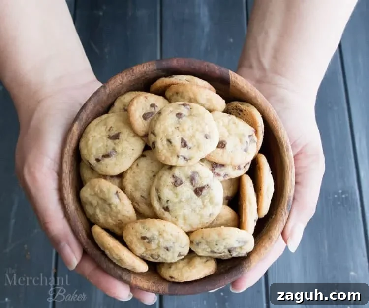 Mini Chocolate Chip Cookies: Perfect One-Bite Treats 4 One Bite Mini Chocolate Chip Cookies have slightly crispy edges and soft, chewy centers. One batch makes a bunch of teeny, tiny cookies, chock full of chocolate chips.