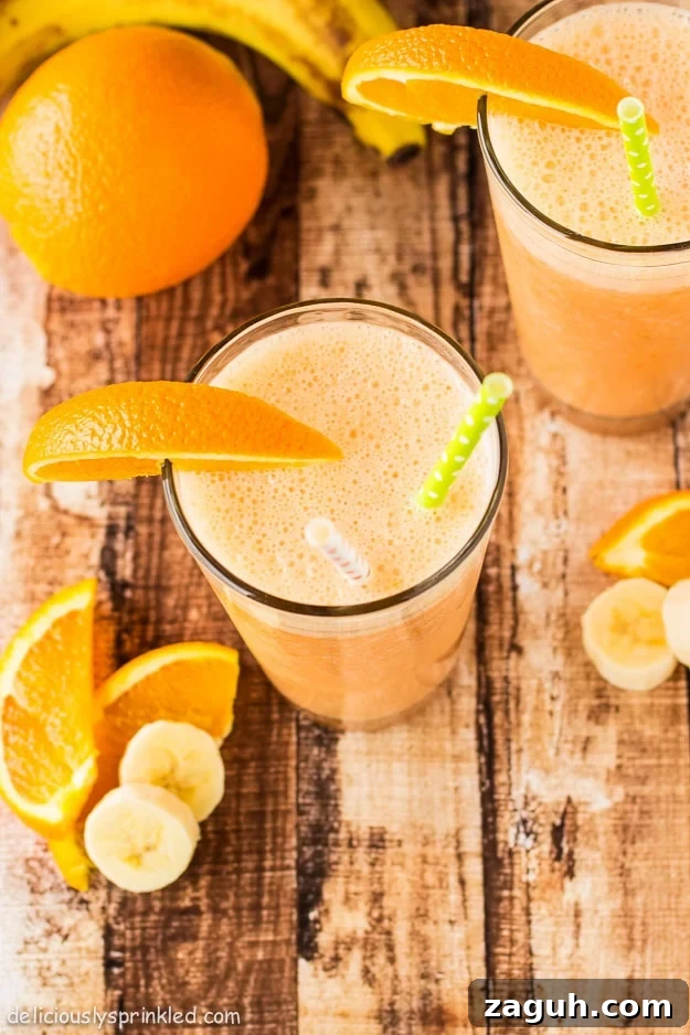 Orange Banana Smoothie Recipe by Deliciously Sprinkled Orange Banana Smoothie Recipe by Deliciously Sprinkled