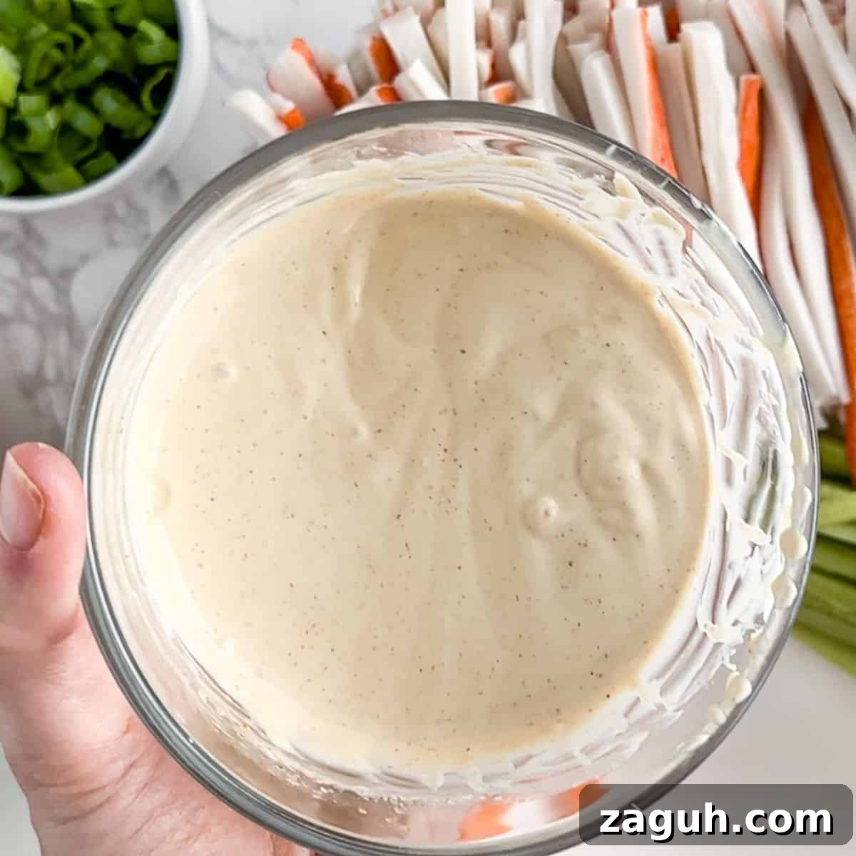 Kani Salad Recipe: Japanese Crab Stick Salad with Sesame Dressing 6 japanese seasoned mayo in a bowl