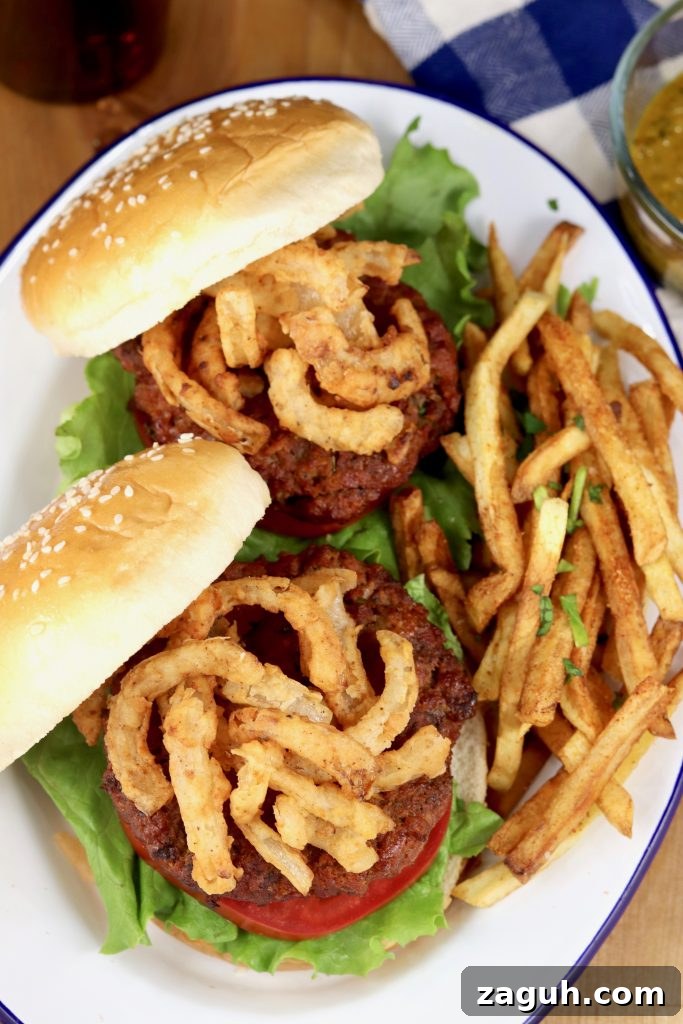 Mustard BBQ Sauce Burgers with onion strings and fries