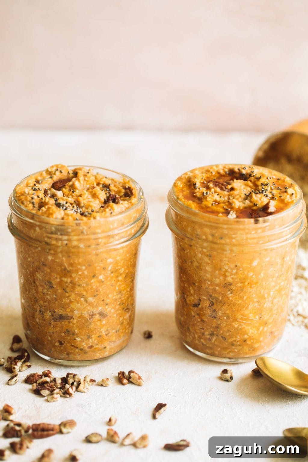 Creamy Pumpkin Overnight Oats Recipe for Fall Breakfast 7 two small jars easy pumpkin pie overnight oats topped with maple syrup and pecans
