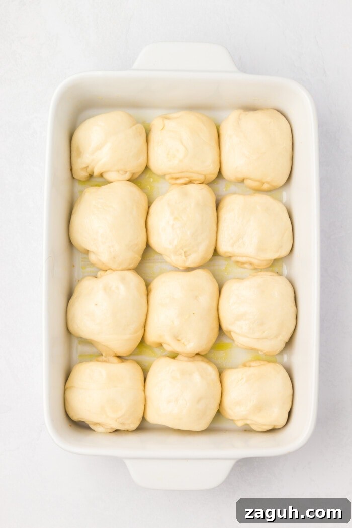 Dough in pan sourdough rolls in baking dish