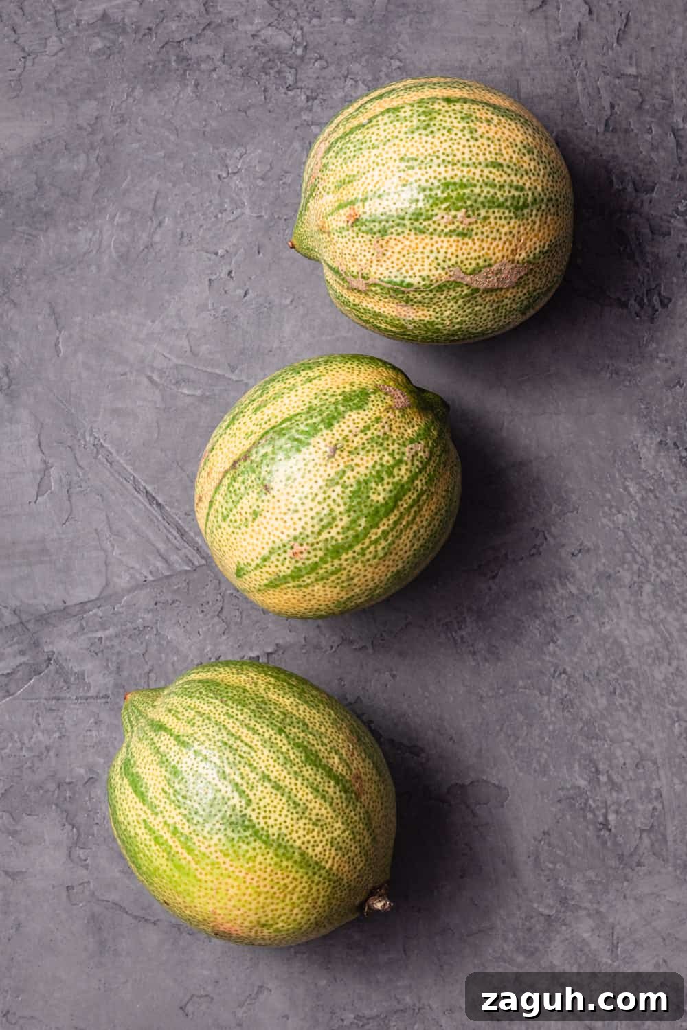Pink Lemons Explained: What They Are, How They Taste, and Uses 3 Three freshly picked pink lemons from the farmers market, showing variegated rind