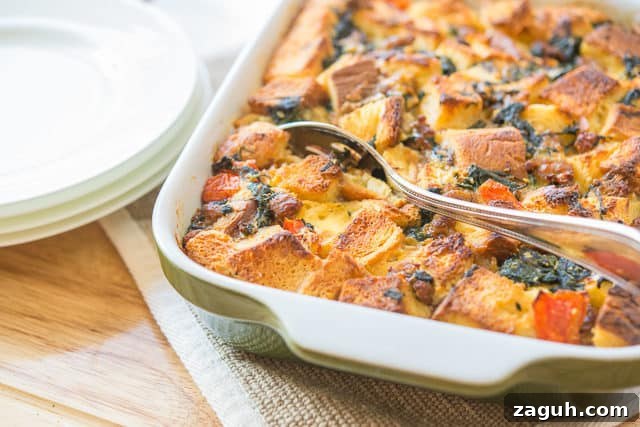 Savory Sausage Breakfast Casserole Recipe for Brunch 4 Make Ahead Breakfast Casserole in Green Dish with Spoon