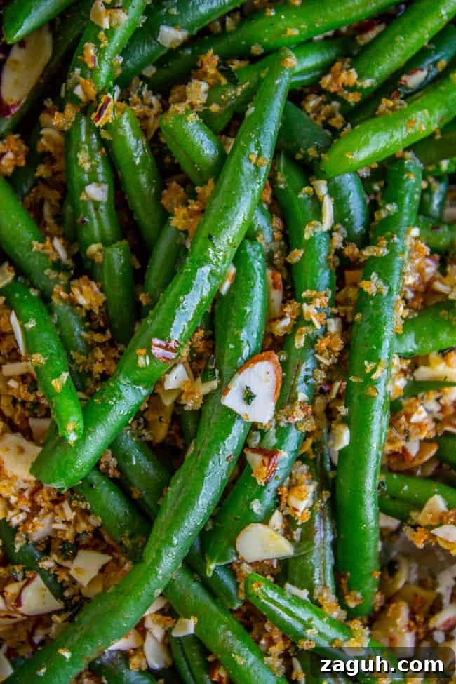 Make-Ahead Garlic Green Beans with Almonds and Crispy Breadcrumbs 2 Green beans with garlic bread crumbs and almonds.