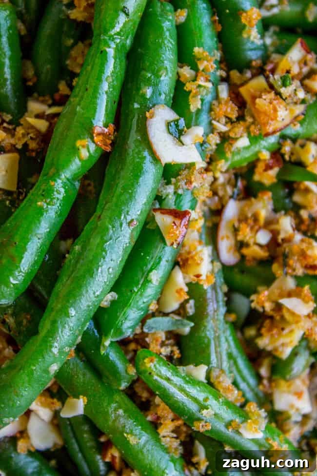 Make-Ahead Garlic Green Beans with Almonds and Crispy Breadcrumbs 12 green beans with almonds and bread crumbs.