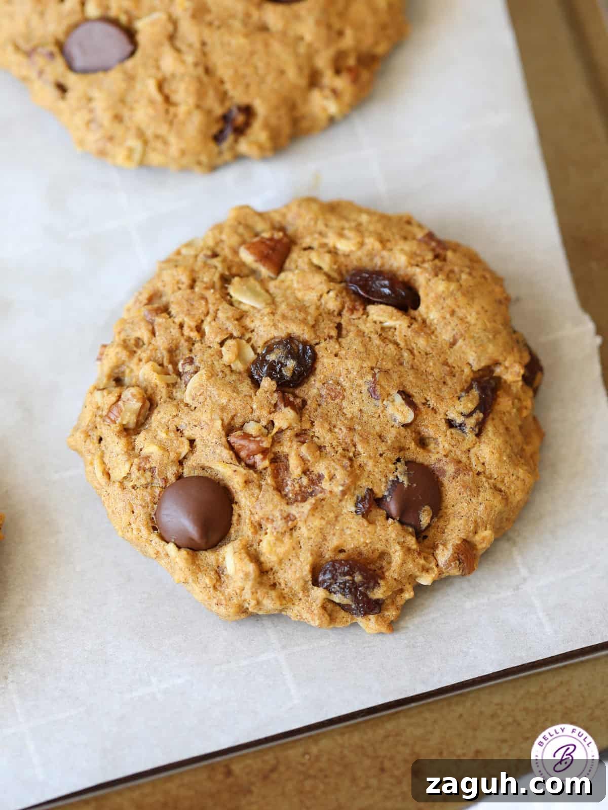 Protein-Packed Breakfast Cookies for Busy Mornings 2 overhead large breakfast cookie on parchment paper
