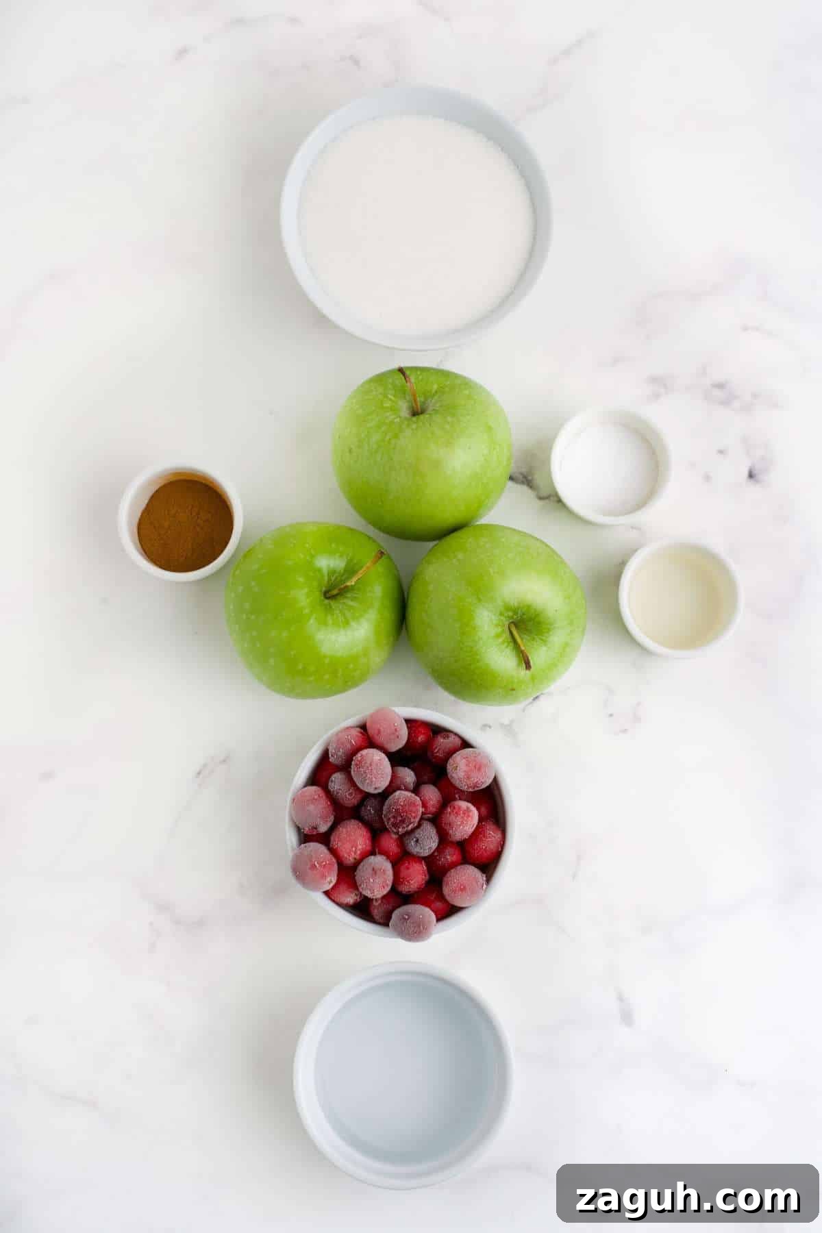 Cranberry Apple Sauce Recipe: Tangy Homemade Spread for Fall 3 Cranberry applesauce ingredients on the countertop before prepping.
