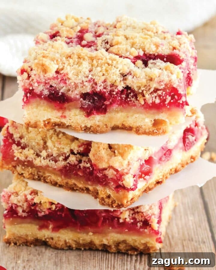 Stack of fresh cranberry bars ready to eat.