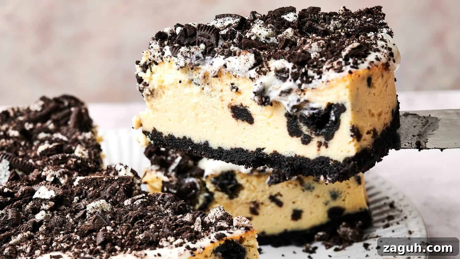 17 Show-Stopping Potluck Recipes That Steal the Spotlight 15 A slice of cookies and cream cheesecake is being lifted from a plate. The cake has a crumbly cookie crust, creamy filling with cookie pieces, and a topping of crushed cookies.