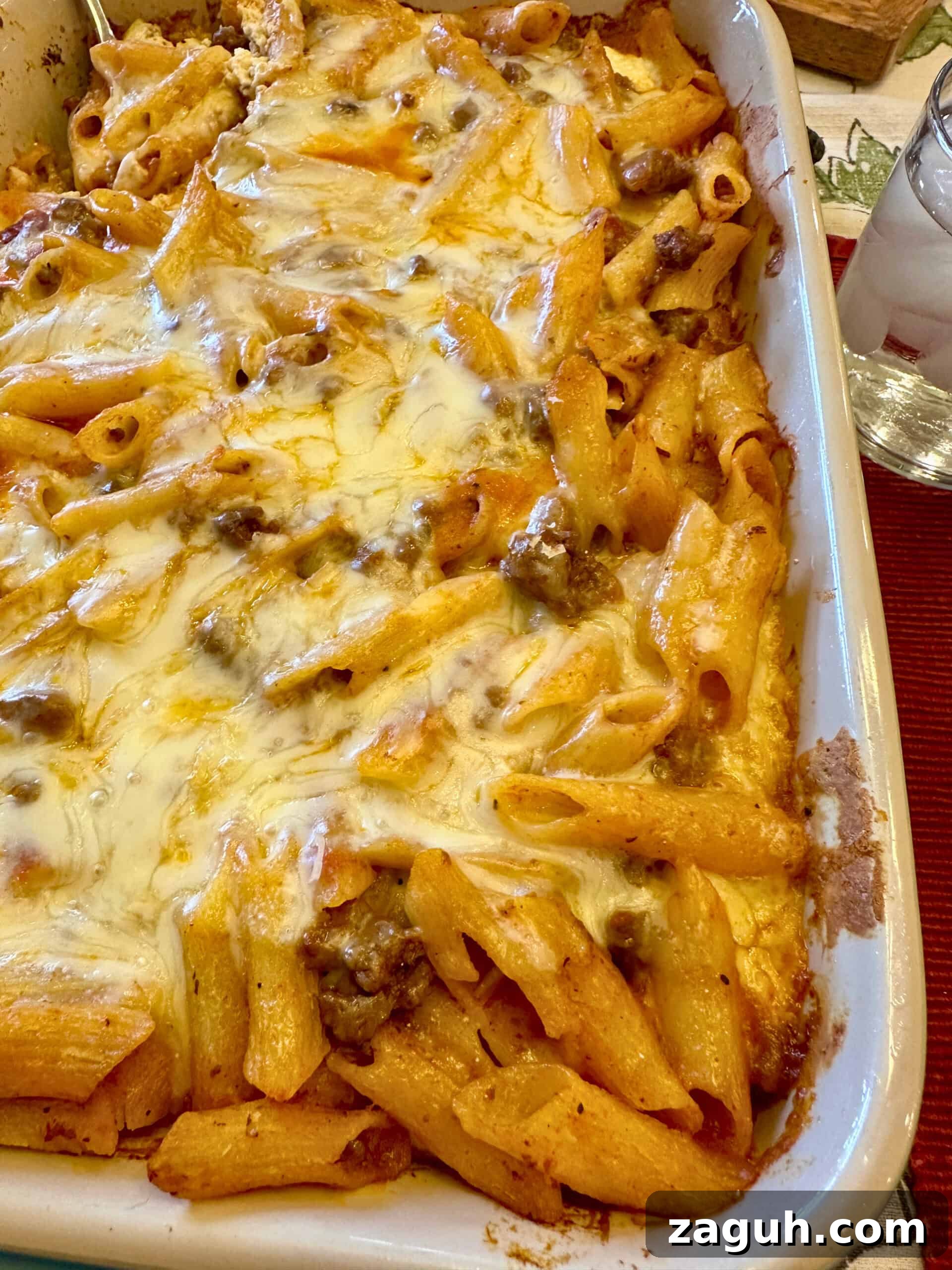 Quick No-Fuss Lasagna Recipe for Busy Weeknights 15 Layered pasta with beef, sauce and melted cheese in a baking dish.