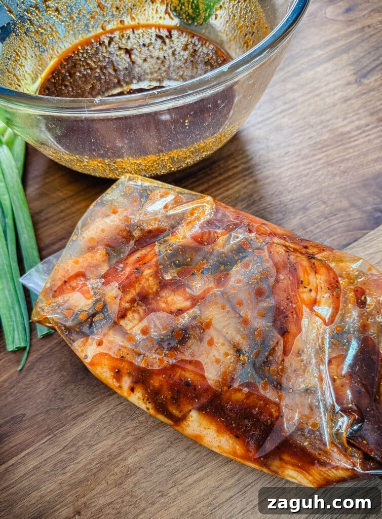Peruvian-Style Chicken Breast Skewers with Aji Marinade 11 Peruvian chicken marinating in a a plastic bag