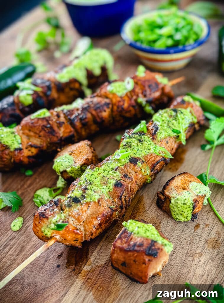 Peruvian-Style Chicken Breast Skewers with Aji Marinade 6 Peruvian chicken skewers made with breast meat with green sauce