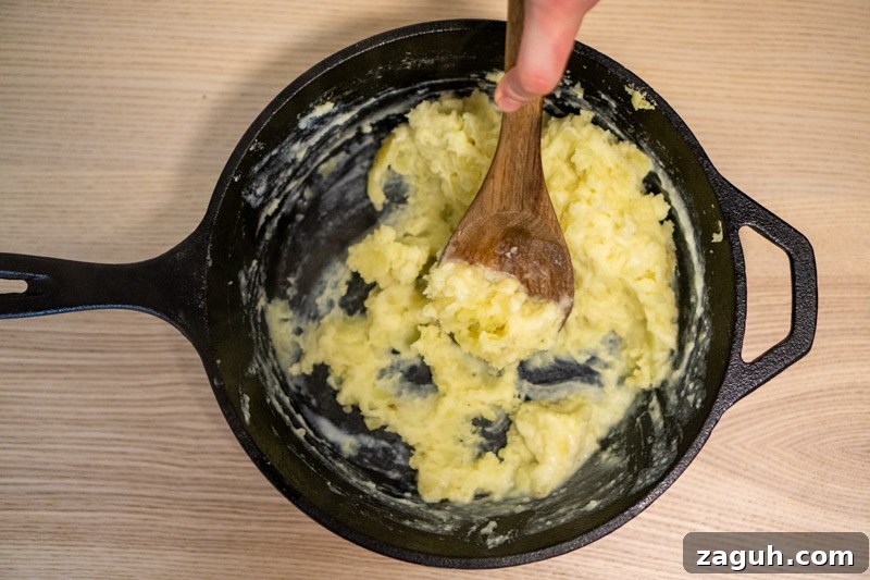 Rustic Buttermilk Mashed Potatoes Without a Masher 7 Mashing the potatoes with no masher!