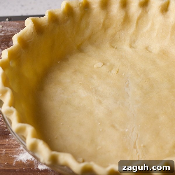 Pecan Pie Made Without Corn Syrup — Classic Recipe with Pure Maple 6 The bottom pie crust, fitted into a pie plate and ready to bake.