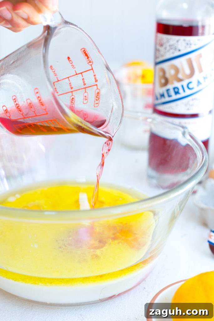 Adding Aperitivo to Orange Aperitivo Olive Oil Cake