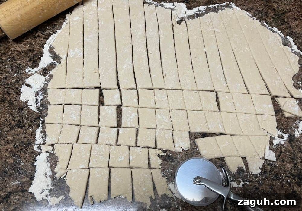 Slow-Cooker Chicken and Dumplings Recipe for Comforting Dinners 8 dumpling dough rolled out thin on a floured surface