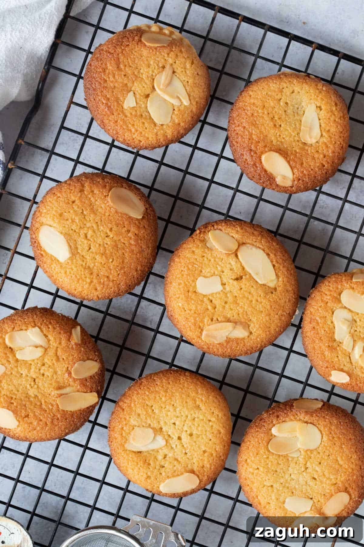 Frangipane Mince Pies Recipe: Classic Almond-Filled Holiday Pastries 7 Frangipane mince pies on a wire cooling rack.