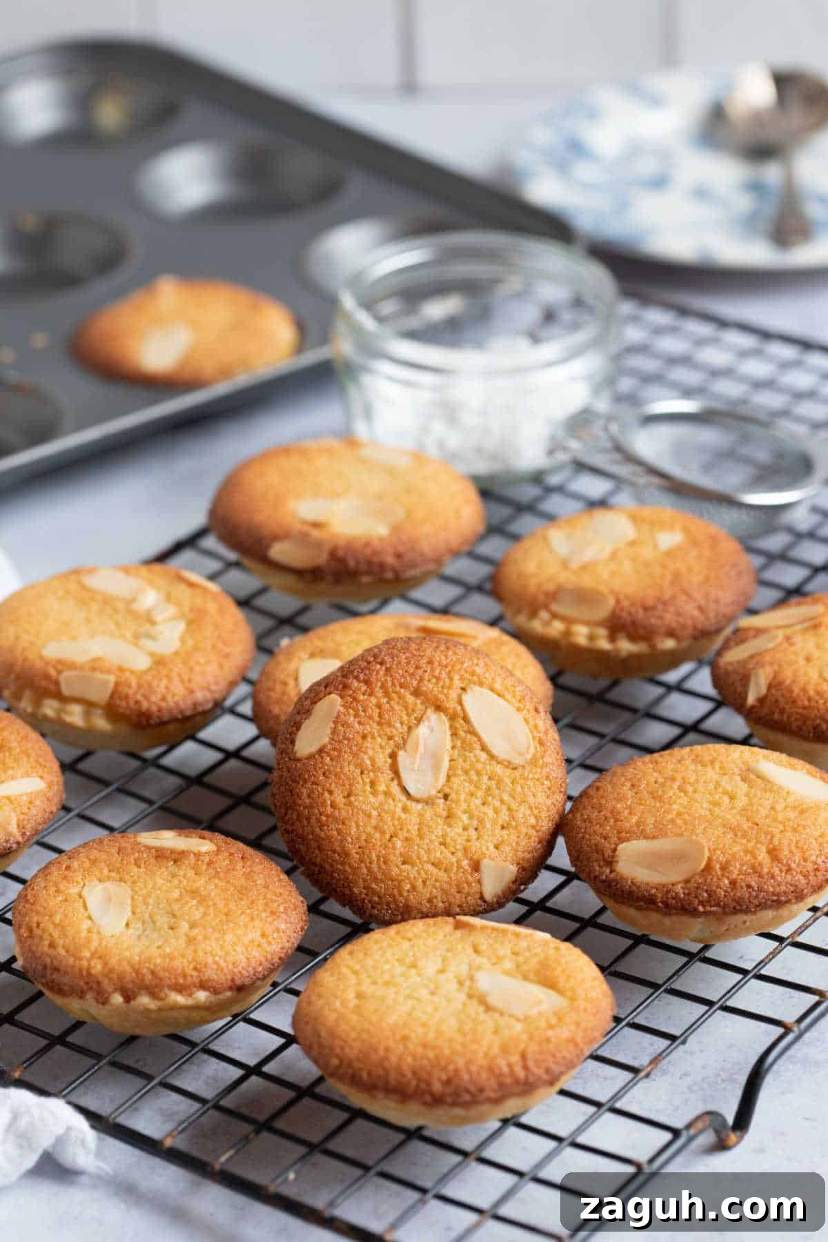 Frangipane Mince Pies Recipe: Classic Almond-Filled Holiday Pastries 8 Frangipane mince pies on a wire rack.
