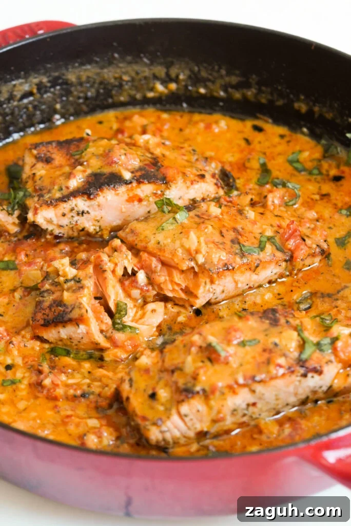 Marry Me Salmon Recipe: Creamy Garlic Butter Salmon You'll Love 14 red skillet with creamy sun dried tomato salmon fillets.